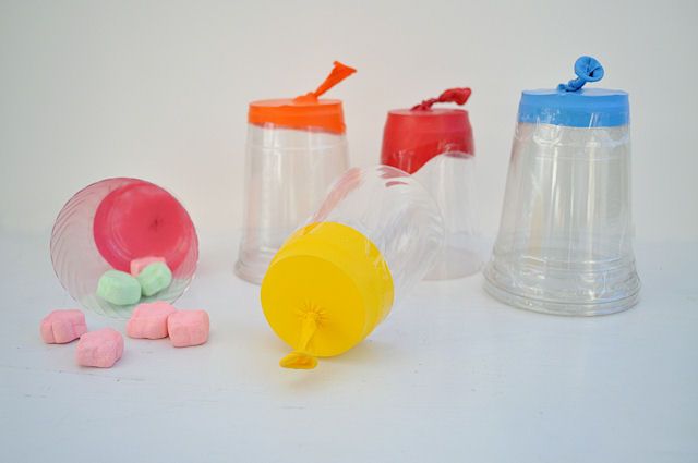 Marshmallow shooter made from a plastic cup and a balloon